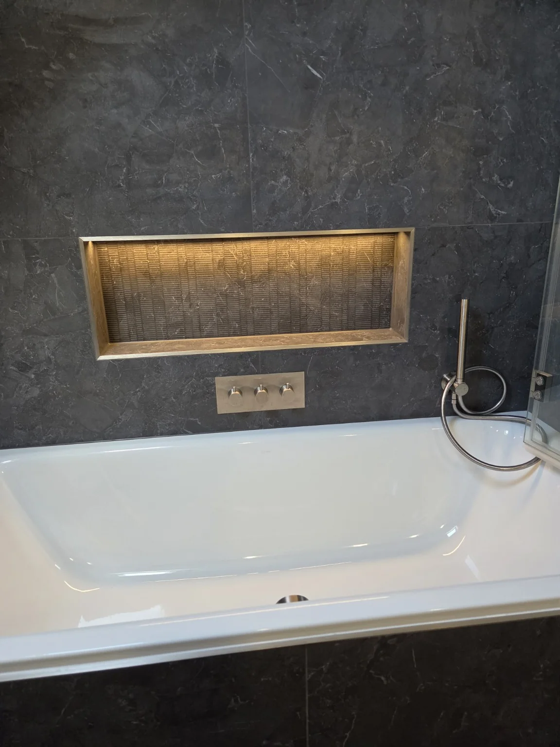Bath and recessed feature niche