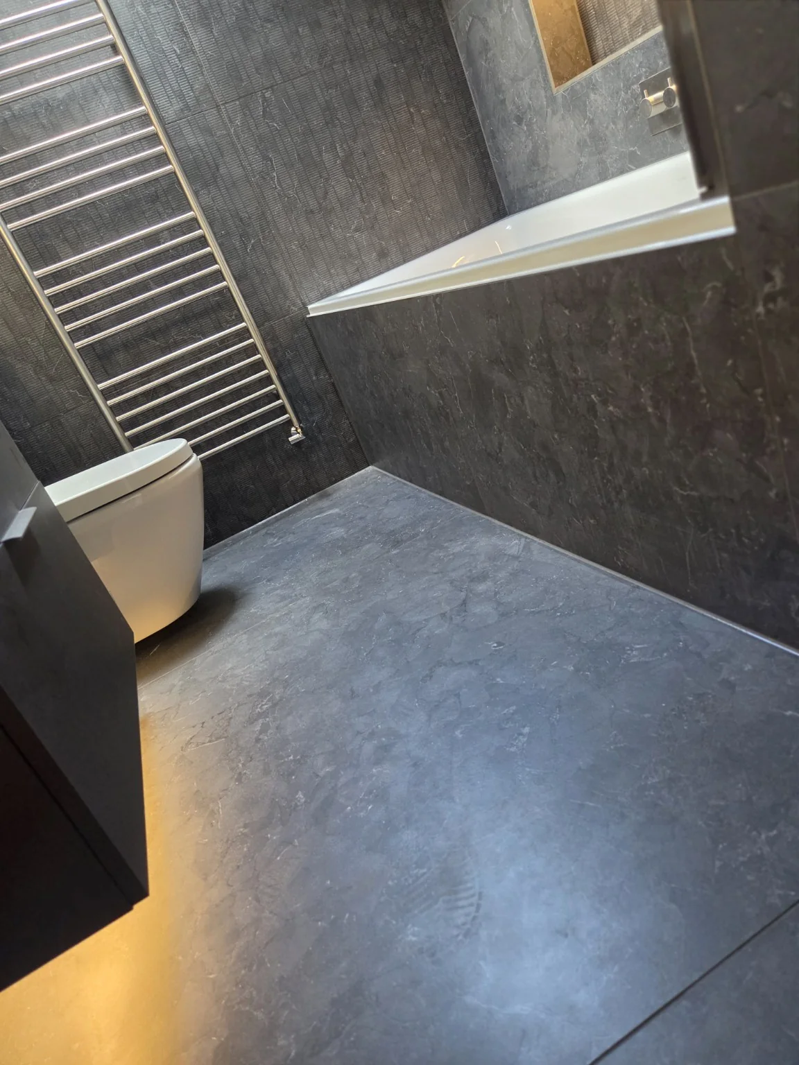 Large-format charcoal floor finish