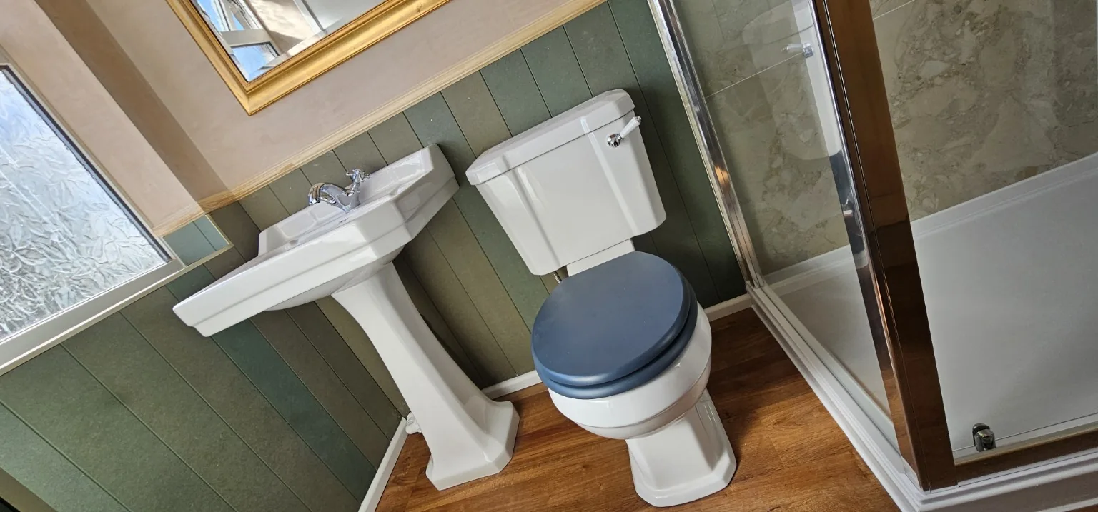 Dark tiled bathroom renovation