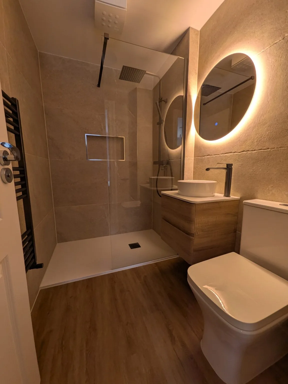 Warm LED shower room showing the complete bathroom
