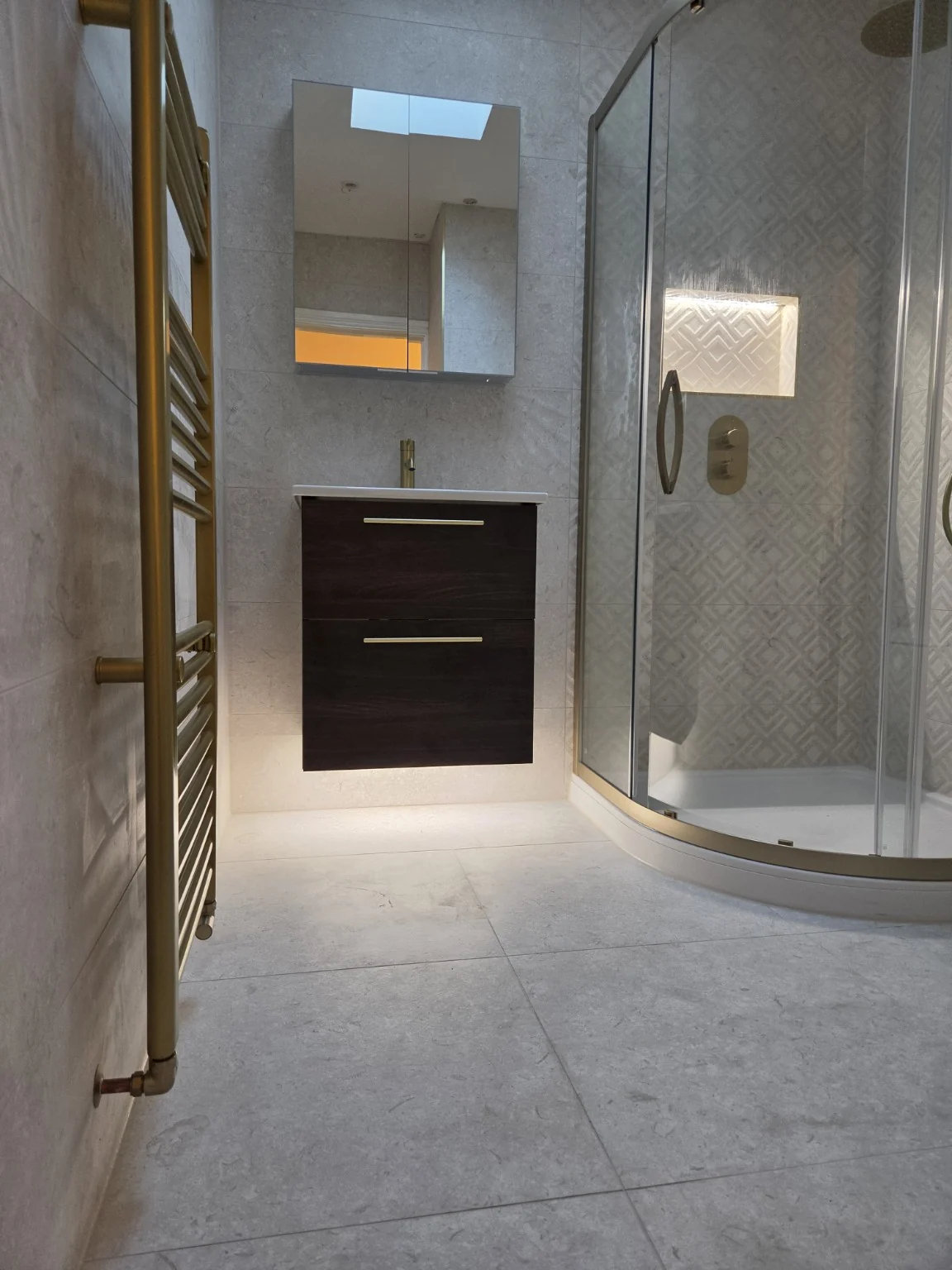 Doorway view of illuminated vanity