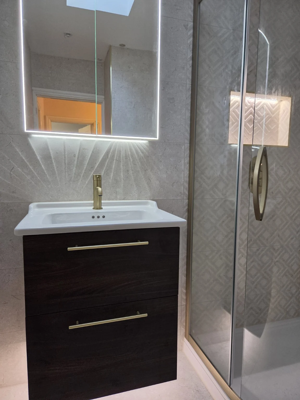 Illuminated mirror and floating vanity
